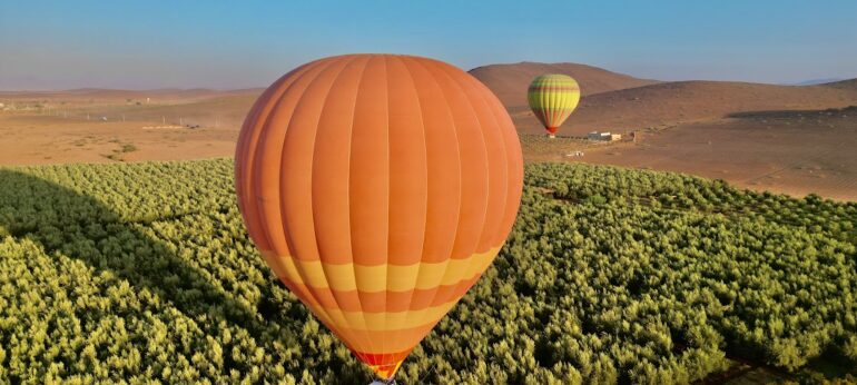 Hot air balloon flight olive trees dar-taliwint marrakech